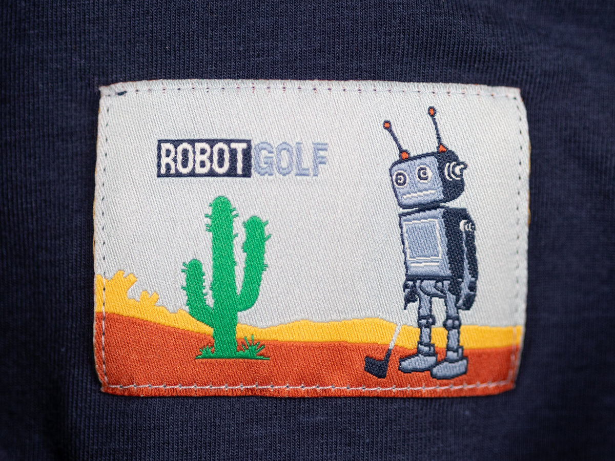 Robot Golf Blue Steel polo, lifestyle view.