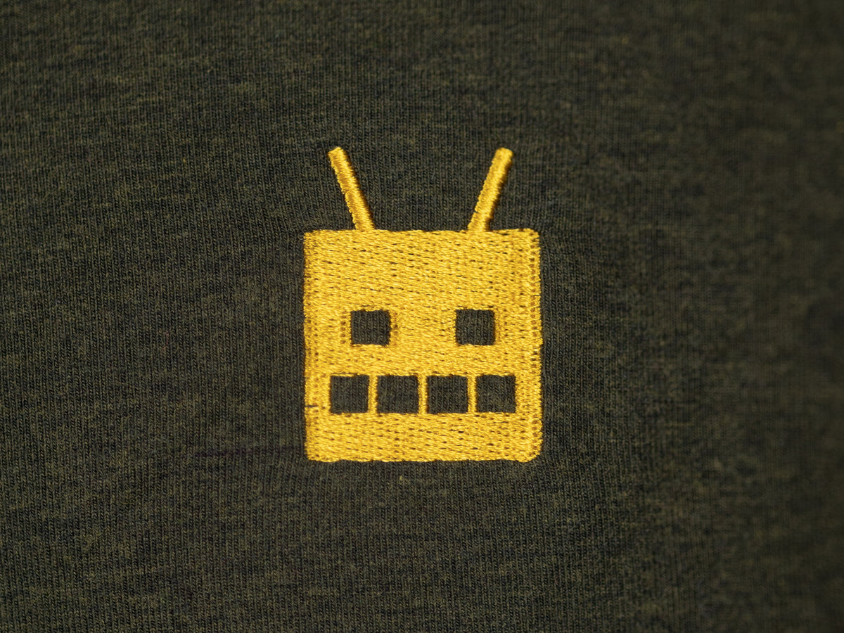 Robot Golf Green Machine polo, lifestyle view.