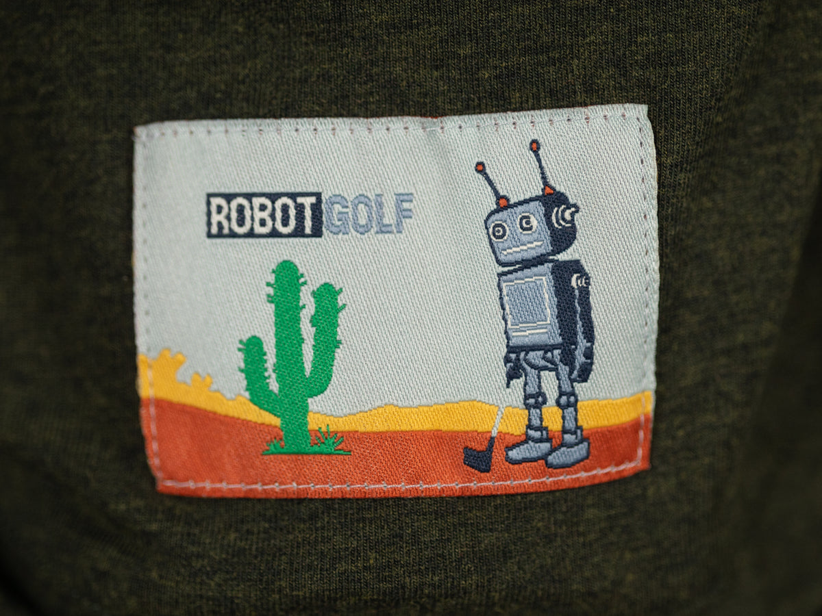 Robot Golf Green Machine polo, lifestyle view.