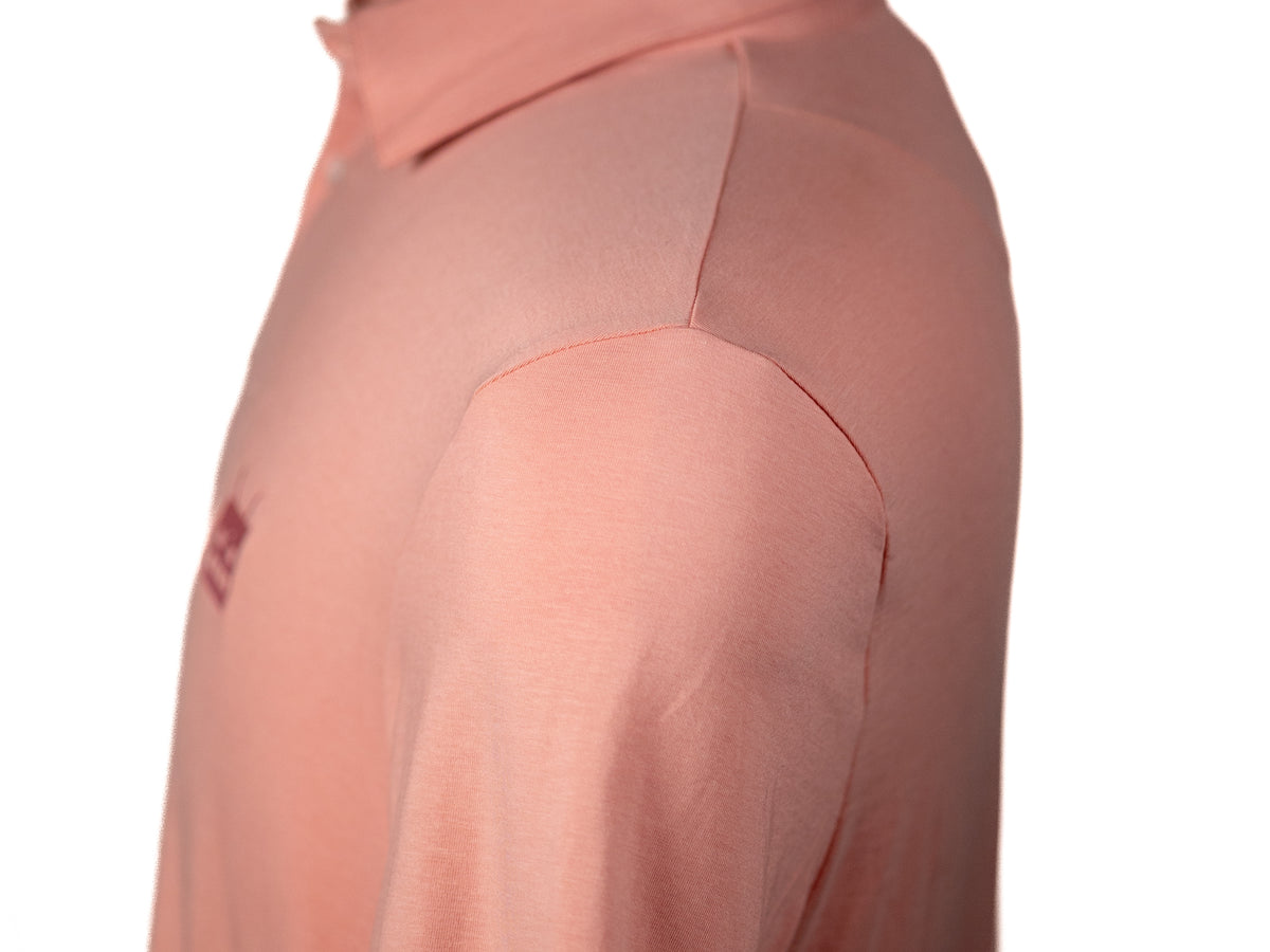 Robot Golf Pink Pony Club polo, lifestyle view.