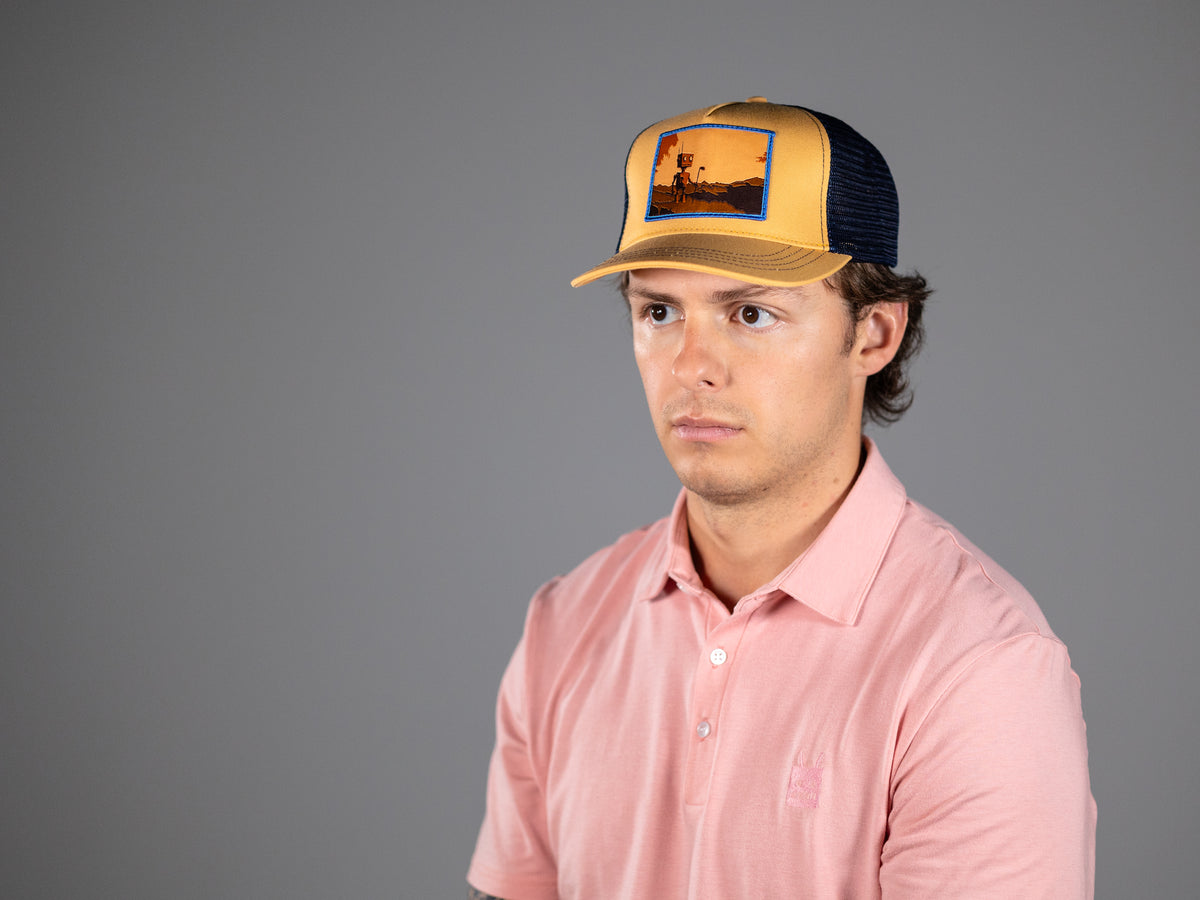 Robot Golf Pink Pony Club polo, lifestyle view.