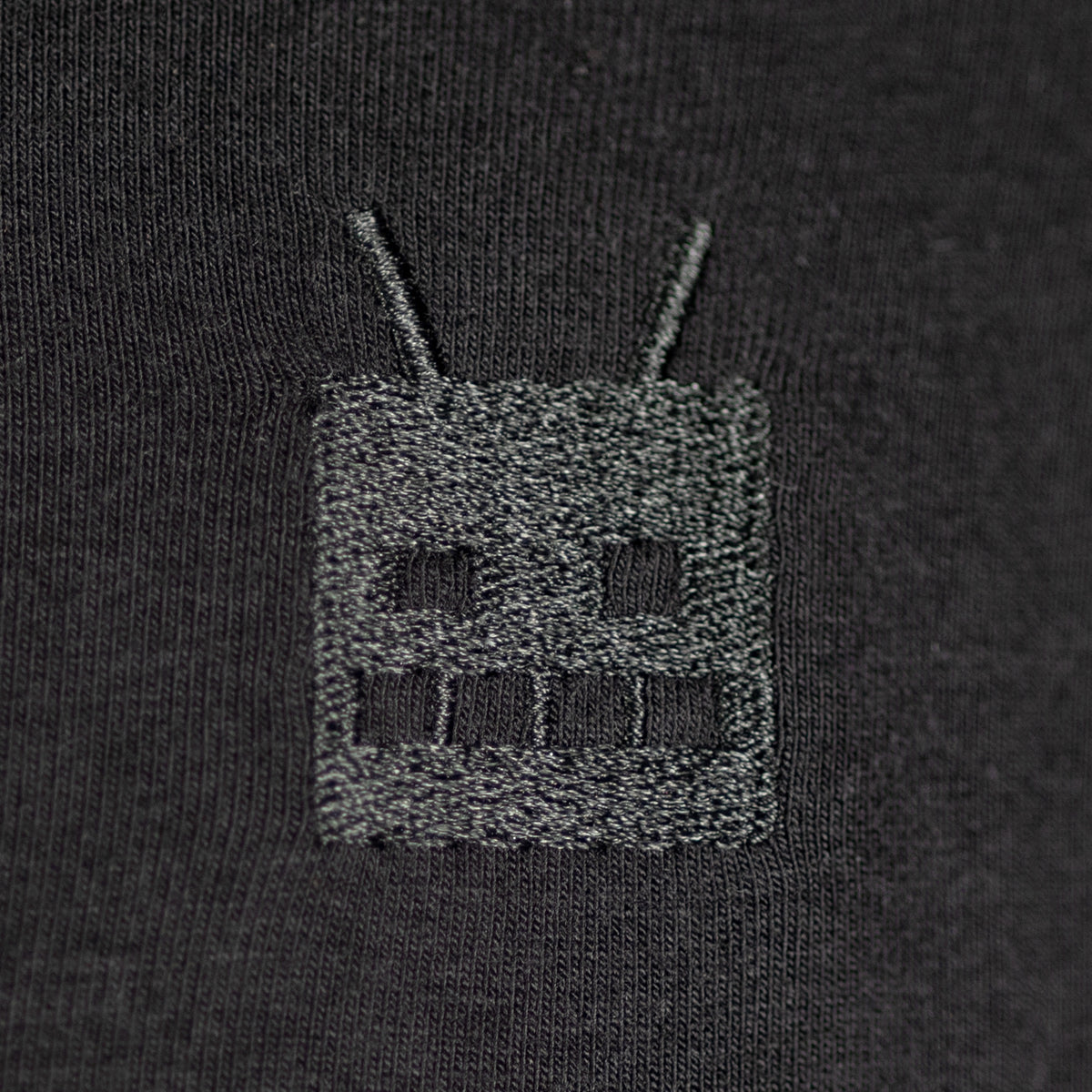 Robot Golf Special Ops Polo, embroidered logo detail, black.